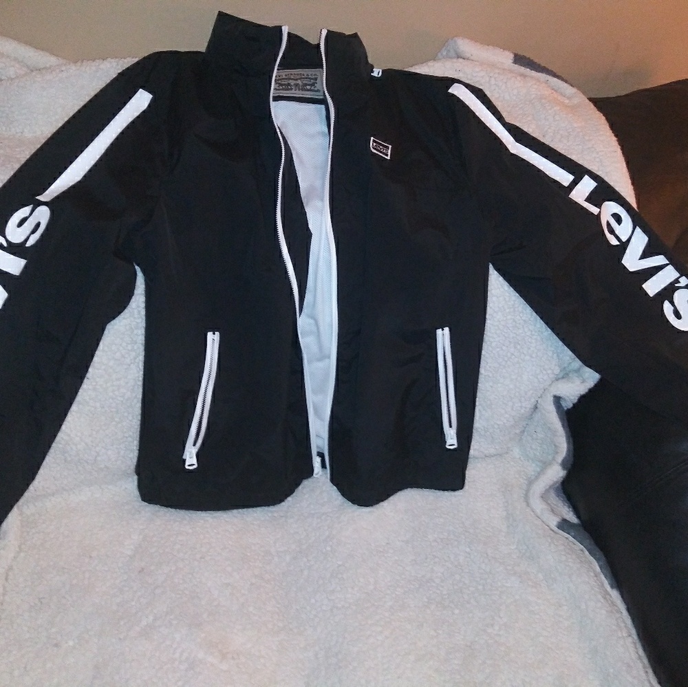 Brand new. Mens Levi black/white windbreaker